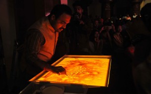 Award winning sand artist, Mr. Raghavendra Hegde showcasing the story of The Akshaya Patra Foundation